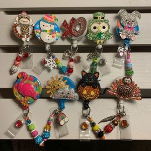 Lot of 9 BEAUTIFUL Dazzled Badge Reels!!